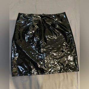Faux patent mini skirt